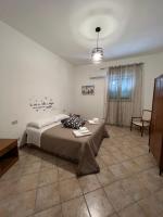 Posteľ alebo postele v izbe v ubytovaní House Corso Calatafimi