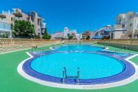 Bazén v ubytování VILLA-CAPRICHO Dunas de la Mata 1 nebo v jeho okolí