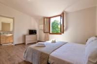 Posteľ alebo postele v izbe v ubytovaní Vico Rooms