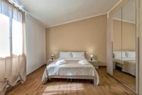 Posteľ alebo postele v izbe v ubytovaní Vico Rooms