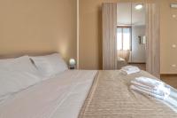 Posteľ alebo postele v izbe v ubytovaní Vico Rooms