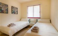 Postel nebo postele na pokoji v ubytování Nice Apartment In Los Alcázares