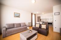 Posedenie v ubytovaní Dok Apartment