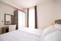 Posteľ alebo postele v izbe v ubytovaní Dok Apartment