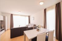Posedenie v ubytovaní Dok Apartment