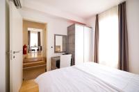 Posteľ alebo postele v izbe v ubytovaní Dok Apartment