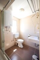 Kúpeľňa v ubytovaní Dok Apartment