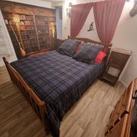 Posteľ alebo postele v izbe v ubytovaní La cabane des sorciers