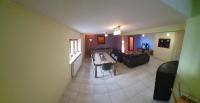 Televízia a/alebo spoločenská miestnosť v ubytovaní Gîte Lilas, LOFT 2 à 8 personnes, avec salle de jeux et SPA dans la résidence