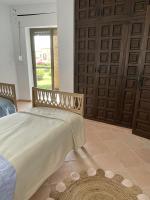 Postel nebo postele na pokoji v ubytování Villa Tropical Dream