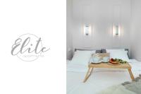 Posteľ alebo postele v izbe v ubytovaní Elite Apartments Boho Old Town
