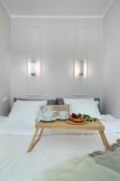 Posteľ alebo postele v izbe v ubytovaní Elite Apartments Boho Old Town