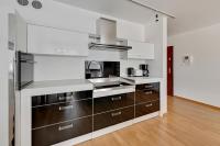 Kuchyňa alebo kuchynka v ubytovaní NORDBYHUS Apartamenty Stara Winiarnia