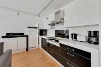 Kuchyňa alebo kuchynka v ubytovaní NORDBYHUS Apartamenty Stara Winiarnia