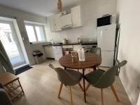 Kuchyňa alebo kuchynka v ubytovaní L’olivier - Appartement