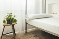 Posteľ alebo postele v izbe v ubytovaní Casa Jam Barcelona