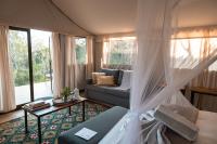 Umkumbe Bush Lodge - Luxury Tented Campにあるシーティングエリア