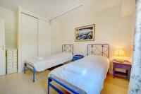 Łóżko lub łóżka w pokoju w obiekcie 3 bedrooms Cannes Center south terrace