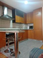 A kitchen or kitchenette at estudio centro vigo