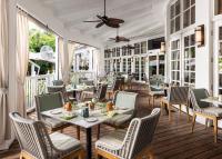 Ein Restaurant oder anderes Speiselokal in der Unterkunft The Palms Hotel &amp; Spa 
