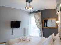 Posteľ alebo postele v izbe v ubytovaní Filoxenia Home Ioannina