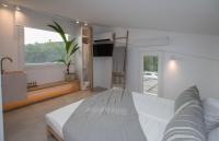 Posteľ alebo postele v izbe v ubytovaní Aristotelia Gi - Premium Luxury Villas with Private Pools