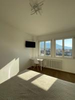 Posteľ alebo postele v izbe v ubytovaní Settimo Cielo Apartment Aosta CIR 0199