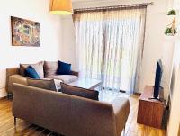 TV a/nebo společenská místnost v ubytování BALI SUITES 404