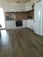 Kuchyňa alebo kuchynka v ubytovaní Apartment Villa Bijele Stijene