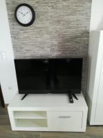 Televízia a/alebo spoločenská miestnosť v ubytovaní Apartment Villa Bijele Stijene