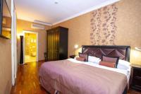 Łóżko lub łóżka w pokoju w obiekcie SKARITZ Hotel & Residence