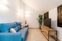 TV a/nebo společenská místnost v ubytování Suites Horno del Oro