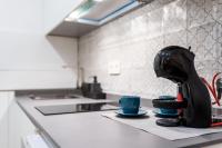 Kuchyň nebo kuchyňský kout v ubytování Suites Horno del Oro