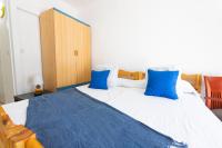 A bed or beds in a room at RNET - Weekend Roses
