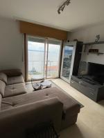 Posedenie v ubytovaní precioso apartamento con vistas al mar