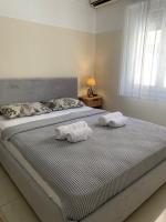 Posteľ alebo postele v izbe v ubytovaní Iviskos living spot