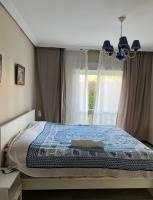 Postel nebo postele na pokoji v ubytování Puerto Banus Medina Garden