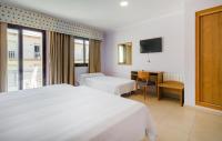 Posteľ alebo postele v izbe v ubytovaní Duerming Montalvo Playa Hotel