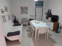 A television and/or entertainment centre at Gallipoli Baia Blu Max