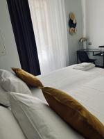 Posteľ alebo postele v izbe v ubytovaní Smart Rooms Naples