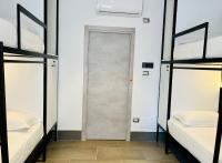 Posteľ alebo postele v izbe v ubytovaní Smart Rooms Naples