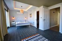 Postel nebo postele na pokoji v ubytování Villa Citrus
