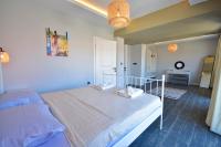 Postel nebo postele na pokoji v ubytování Villa Citrus