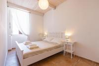 Posteľ alebo postele v izbe v ubytovaní Sea view New Apartment Ortigia