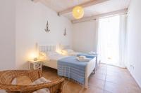 Posteľ alebo postele v izbe v ubytovaní Sea view New Apartment Ortigia