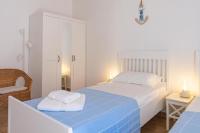 Posteľ alebo postele v izbe v ubytovaní Sea view New Apartment Ortigia