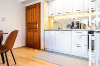 A kitchen or kitchenette at Apartment Harmony - Tatranska Lomnica, Javorinka