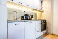 A kitchen or kitchenette at Apartment Harmony - Tatranska Lomnica, Javorinka
