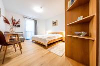 A bed or beds in a room at Apartment Harmony - Tatranska Lomnica, Javorinka