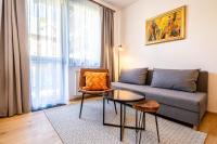 A seating area at Apartment Harmony - Tatranska Lomnica, Javorinka